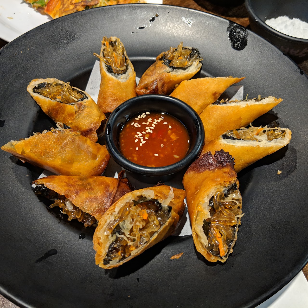 Assorted Korean fried snacks with dipping sauce